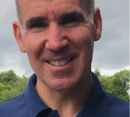 Wilson Leggett Wilson is a smiling man in a blue shirt